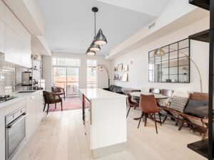 Open-concept living, dining, and kitchen | 243 Perth Ave PH307 | the BREL team